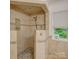 Beautifully tiled walk-in shower with mosaic accents and a built-in niche at 8 Sunrise Point Rd, Lake Wylie, SC 29710