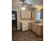 Functional kitchen with light-colored cabinets, laminate countertops, and basic appliances at 8000 Chapman St, Charlotte, NC 28216