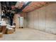 Unfinished basement features concrete walls, exposed insulation, and plumbing at 8066 Edgewater Dr # 103, Norwood, NC 28128