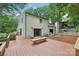 Wonderful backyard featuring a multi-tiered wooden deck, ideal for outdoor gatherings and relaxation at 8117 Rising Meadow Rd, Charlotte, NC 28277