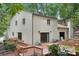 Charming home featuring a spacious wooden deck perfect for outdoor entertaining at 8117 Rising Meadow Rd, Charlotte, NC 28277