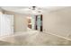 Spacious bedroom featuring a ceiling fan and neutral carpet floors and walls at 8117 Rising Meadow Rd, Charlotte, NC 28277