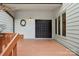 Inviting front porch area with double doors, a wreath, and ample space for greeting guests at 8117 Rising Meadow Rd, Charlotte, NC 28277