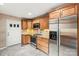 Well-equipped kitchen with stainless steel refrigerator and updated appliances at 8117 Rising Meadow Rd, Charlotte, NC 28277