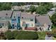 Birds eye view of townhome exteriors, yards, decks and patios at 9006 Four Mile Creek Rd, Charlotte, NC 28277