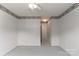 Empty bedroom with carpeted floors and border wallpaper at 9006 Four Mile Creek Rd, Charlotte, NC 28277