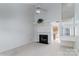 Bright living room with vaulted ceilings, fireplace, and open staircase, creating a welcoming atmosphere at 9006 Four Mile Creek Rd, Charlotte, NC 28277