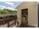 Spacious outdoor storage area on the deck, ideal for storing tools and equipment at 9006 Four Mile Creek Rd, Charlotte, NC 28277