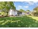 Charming exterior features a brick facade and lush lawn at 1041 Brawley School Rd, Mooresville, NC 28117