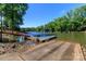 Community boat ramp and dock providing easy access to the tranquil lake for boating and water activities at 10419 Chelsea Bay Dr, Charlotte, NC 28278