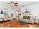 Bright living room featuring hardwood floors, stylish furniture, and natural light at 10419 Chelsea Bay Dr, Charlotte, NC 28278