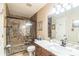 Stylish bathroom with walk-in shower, marble vanity, and updated fixtures at 105 Carmel Hills Dr, Gastonia, NC 28056