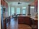 Spacious kitchen features a breakfast nook, stainless steel appliances, and granite countertops at 1108 Tarram Ct # 12, Lancaster, SC 29720