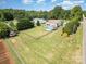 Aerial view of property with fenced backyard and above ground pool at 115 Meadow Lake Dr, Salisbury, NC 28146