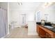 Spacious bathroom featuring tile floors, granite vanity, and walk in shower at 115 Meadow Lake Dr, Salisbury, NC 28146