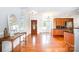 Home entryway with hardwood floors, leading to the kitchen at 115 Meadow Lake Dr, Salisbury, NC 28146