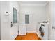Mudroom features a modern washer and dryer, and a chest freezer at 115 Meadow Lake Dr, Salisbury, NC 28146