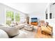 Comfortable living room with large windows and classic furnishings at 120 Labans Ln, Lincolnton, NC 28092
