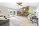 Living room with exposed brick fireplace and large French doors at 120 Labans Ln, Lincolnton, NC 28092