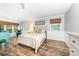 Bedroom with hardwood floors, windows and comfortable seating at 120 Labans Ln, Lincolnton, NC 28092