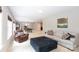 Spacious living room with ample seating, neutral tones, and stylish decor at 132 Parkside Ln, Mooresville, NC 28117