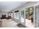 Recreation room with neutral tones, outdoor access, and plenty of natural light at 132 Parkside Ln, Mooresville, NC 28117