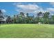 Expansive backyard featuring a well-maintained lawn and a perimeter fence, perfect for outdoor activities at 1327 Springlake Rd, York, SC 29745