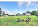 Spacious backyard with a fire pit area, comfortable seating, and a view of the house at 1327 Springlake Rd, York, SC 29745