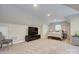 Spacious bedroom featuring a large flat-screen TV, comfortable seating, and a cozy queen-sized bed at 1327 Springlake Rd, York, SC 29745