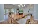 Open dining area showcasing views of the living room, backyard, and stylish modern decor at 1327 Springlake Rd, York, SC 29745