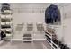 Organized walk-in closet with multiple shelves and hanging racks for clothes and accessories at 1327 Springlake Rd, York, SC 29745