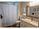 Bathroom features a vanity with granite countertop and a shower with curtain at 150 Wordsworth Way, Mooresville, NC 28115