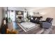 Open living room with wood flooring, fireplace, and modern decor at 150 Wordsworth Way, Mooresville, NC 28115