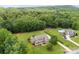 Spacious property with a manicured lawn, mature trees, and a swimming pool in the backyard at 1533 Ohara Plantation Ct, Dallas, NC 28034