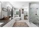 Beautiful primary bathroom with dual vanity, soaking tub, and separate glass shower at 1533 Ohara Plantation Ct, Dallas, NC 28034