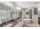 Luxurious bathroom boasts double sinks, a standalone tub, and a walk-in shower at 1533 Ohara Plantation Ct, Dallas, NC 28034