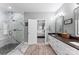 Comfortable primary bathroom with walk-in shower and access to the bedroom at 1533 Ohara Plantation Ct, Dallas, NC 28034