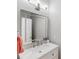 Up close of the sink in the bathroom; the mirror reflects a doorway to another room at 1533 Ohara Plantation Ct, Dallas, NC 28034