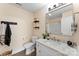 Bright bathroom features a vanity with a modern faucet and stylish decor at 1533 Ohara Plantation Ct, Dallas, NC 28034
