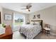 Bright bedroom with large window overlooking the yard at 1533 Ohara Plantation Ct, Dallas, NC 28034