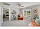 Serene bedroom featuring a comfortable chair, and abundant natural light creating a relaxing atmosphere at 1533 Ohara Plantation Ct, Dallas, NC 28034
