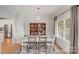 Elegant dining room with hardwood floors and wooden shelving at 1533 Ohara Plantation Ct, Dallas, NC 28034