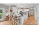 Well-designed kitchen with granite countertops, stainless steel appliances, and breakfast bar at 1533 Ohara Plantation Ct, Dallas, NC 28034