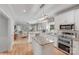 Spacious open-concept kitchen featuring a granite island and modern appliances at 1533 Ohara Plantation Ct, Dallas, NC 28034