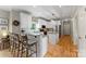 Charming kitchen featuring granite countertops, modern appliances, and a breakfast bar at 1533 Ohara Plantation Ct, Dallas, NC 28034