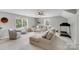 Comfortable living room with plush seating, neutral decor, and abundant natural light, perfect for relaxation and entertainment at 1533 Ohara Plantation Ct, Dallas, NC 28034