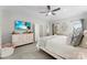 Comfortable main bedroom with a TV, dresser, and bright natural light at 1533 Ohara Plantation Ct, Dallas, NC 28034