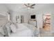 Bright main bedroom features a ceiling fan, windows, and access to a closet at 1533 Ohara Plantation Ct, Dallas, NC 28034