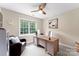 Bright home office featuring a large window and comfortable leather chair at 1533 Ohara Plantation Ct, Dallas, NC 28034