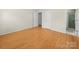 Clean bedroom with hardwood floors and access to an ensuite bathroom at 1830 Huntington Pl, Rock Hill, SC 29732